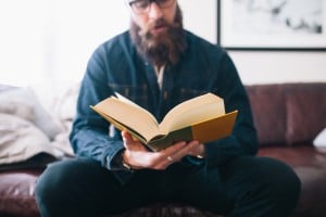 image of man reading a book